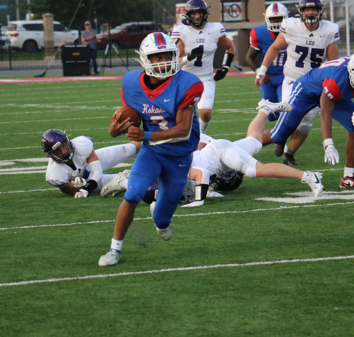 Senior quarterback Reis Beard moves the ball down the field. Beard led the Wildkats to a come from behind victory over Leo.