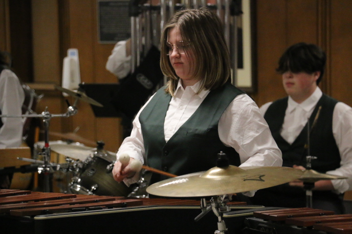 Junior Maddy Paul plays with the indoor percussion ensemble at the KHS open house in February. 