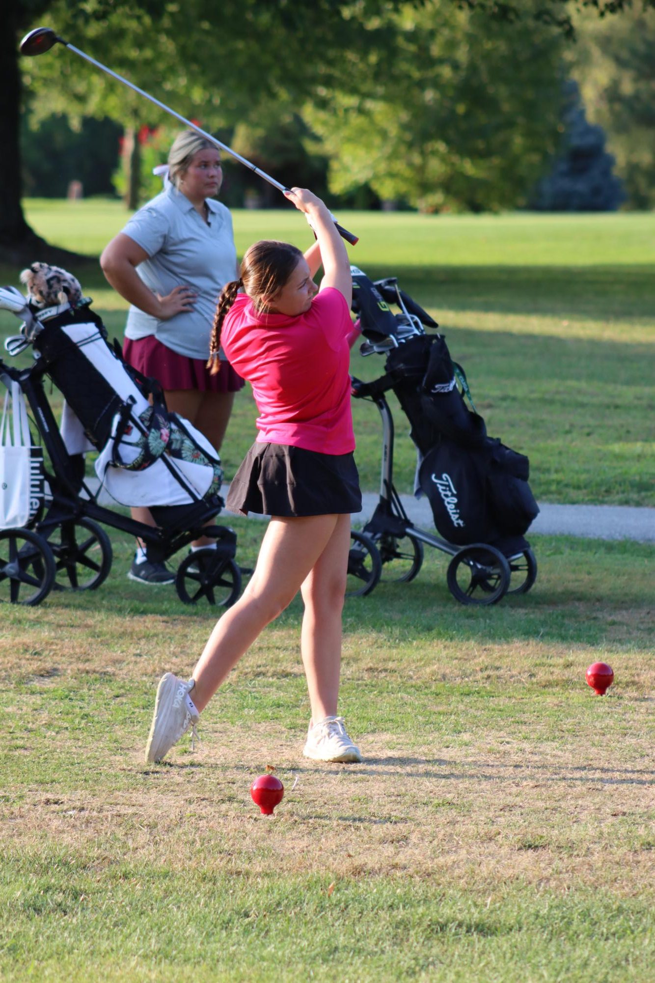 Senior Matilda Stout tees off in a match at the Kokomo Country Club. Stout missed advancing to regional competition by only one stroke. 