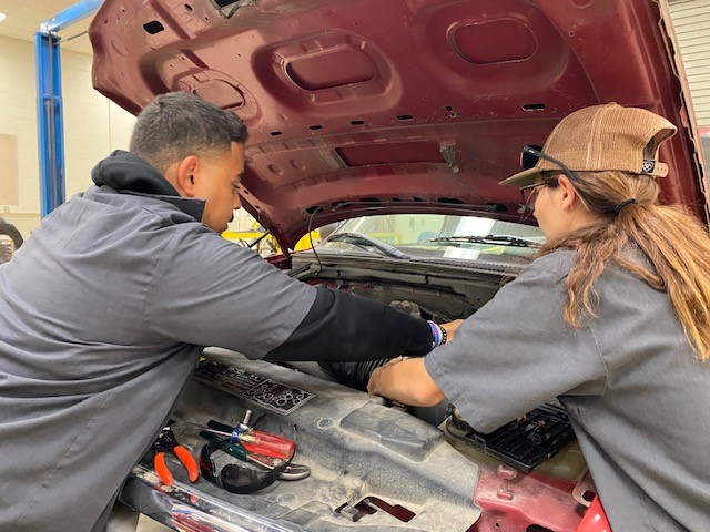 Students in the Automotive Tech class work on a car during the first week of classes. The KACC offers classes in both Auto Tech and Collision Repair. 